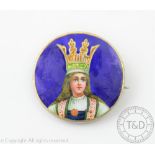 A Continental silver enamelled circular brooch depicting a crowned female figure, late 19th century,