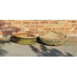 Two cast iron corner troughs / feeders,