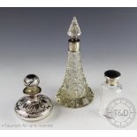 An Art Nouveau silver overlay scent bottle and stopper, 8cm high,