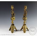 A pair of 19th century style cast brass candlesticks comprised of spears,