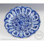 A late 17th century Chinese porcelain Kraak style blue and white plate,