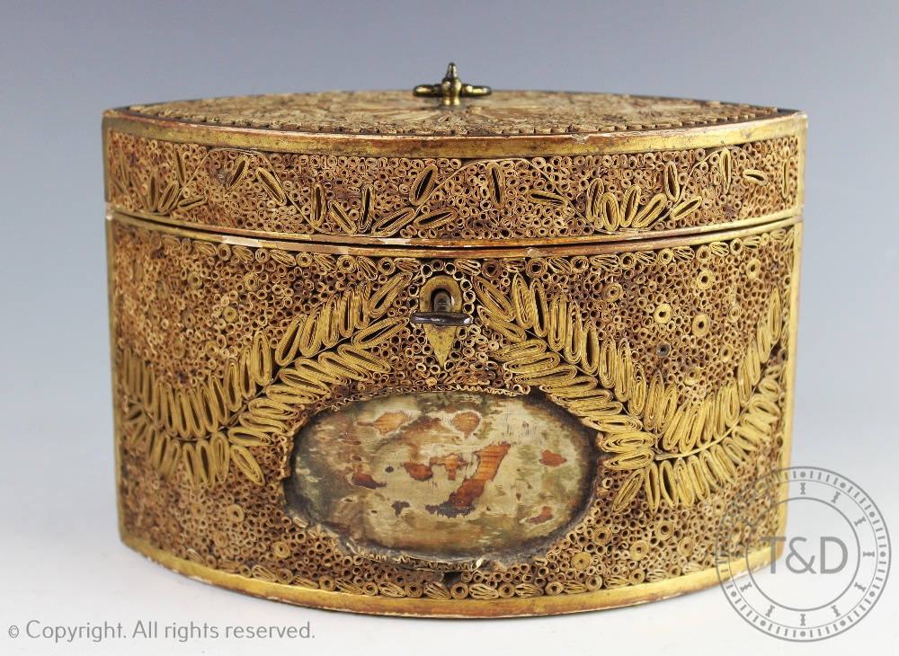 A late George III rolled paper scroll work tea caddy, of navette shape,