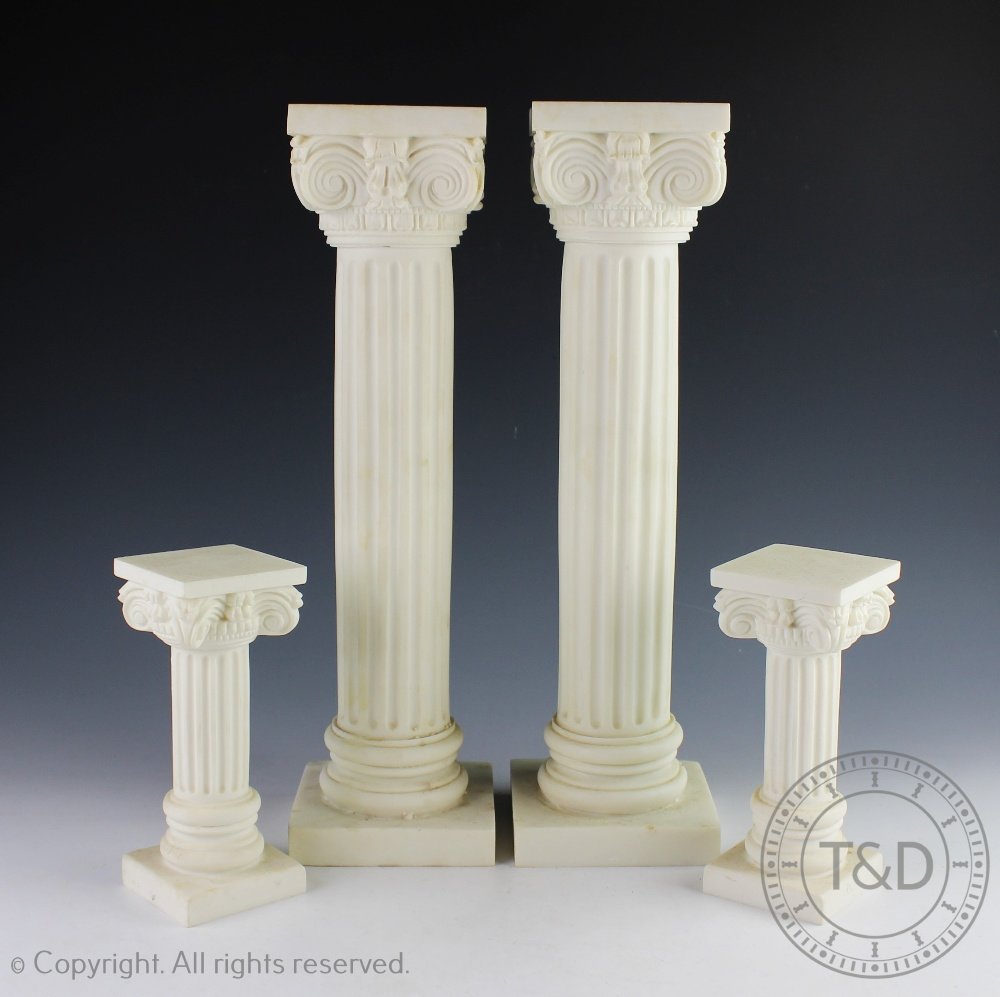 A pair of modern alabaster fluted doric columns, made in Greece, 39.