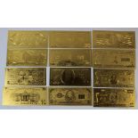 A collection of twelve American 24K gold foil bank notes, comprising $1, $2, $5, $10, $20, $50,
