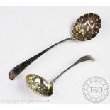 A George III silver ladle with later Victorian embossing, Benjamin Mountigue, London,