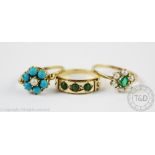 A three stone turquoise set ring in 9ct gold,