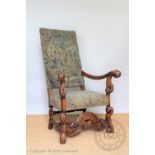 A late 17th century style carved walnut high back chair,