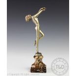An Art Deco figure of a dancer in the manner of Josef Lorenzl, on marble base, 20.