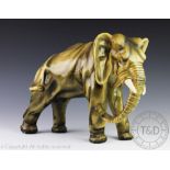 A 1930's Bacci and Bacci plaster model of an elephant, signed to the underside,