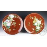 A pair of 19th century Minton Aesthetic earthenware chargers,