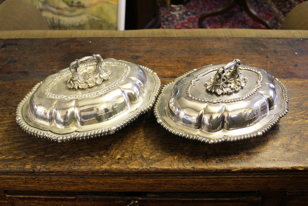 A pair of Victorian silver plated serving dishes and covers,