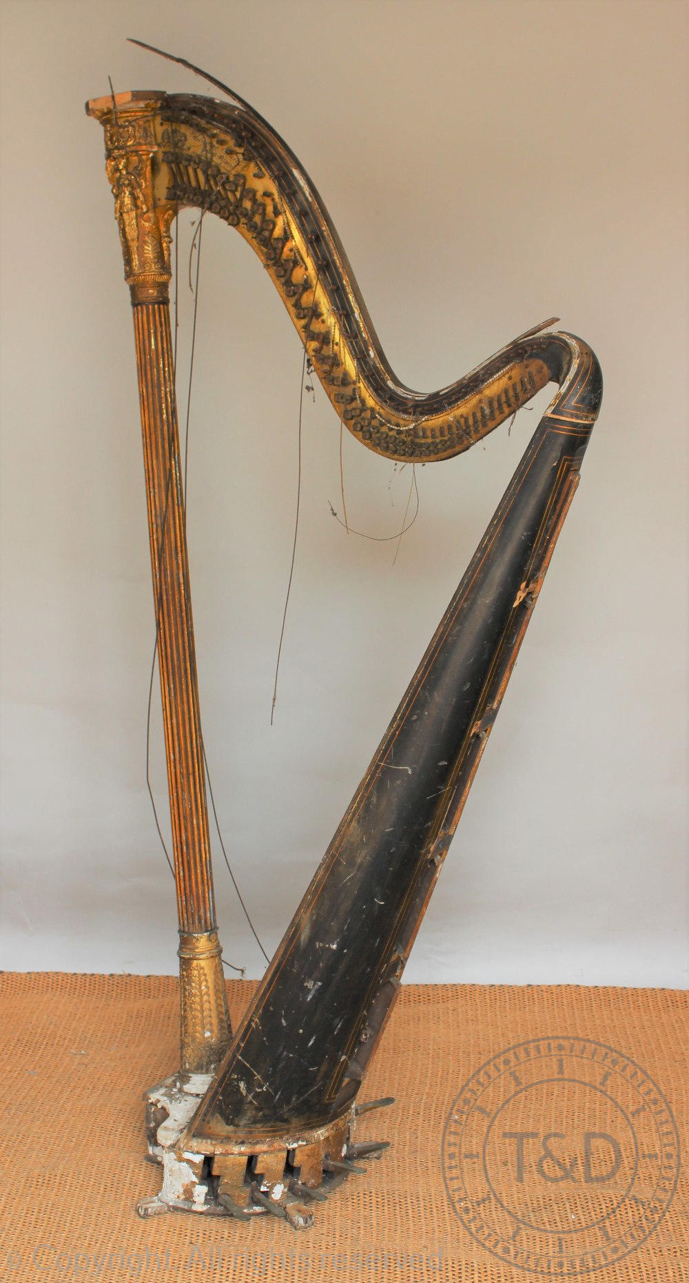 An early 19th century gilt wood and gesso harp by Sebastian Erard, in need of complete restoration,