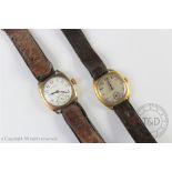 A gentlemens 9ct gold cased Waltham USA wristwatch, with white enamel dial,