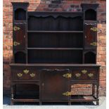 An 18th century style high back oak dresser,