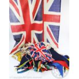 A selection of vintage bunting, comprising two bundles of linen Union Flag bunting,