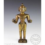An Indian bronze model of a Bodhisattva, modelled standing with each hand in a mudra position,