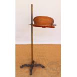 A Victorian brass and cast iron adjustable reading stand, 111cm H,