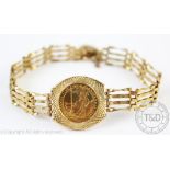 A 9ct yellow gold gate style bracelet set with a '1/10 ounce fine gold', attached padlock clasp,
