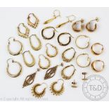 Thirteen pairs of 9ct yellow gold hoop earrings, each in varying design, gross weight 26.
