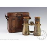 A pair of World War One German binoculars in original leather case with insctuctions to the