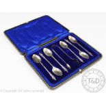 A cased set of six silver Apostle teaspoons, Lee & Wigfull, Sheffield 1937,