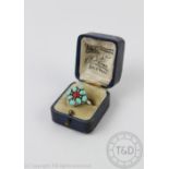 A turquoise and coral coloured dress ring, all set in white metal stamped '925', weight 5.