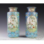 A near pair of Chinese porcelain rouleau vases, Jiaqing (1796-1820) seal mark,