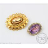 An amethyst and seed pearl set Victorian brooch,