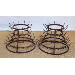 A pair of vintage bottle drying racks,