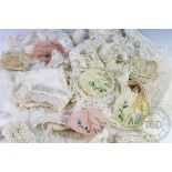 A selection of bobbin and needle lace fragments and to include;