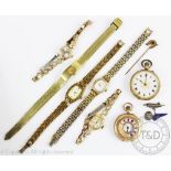 A collection of pocket and wristwatches,