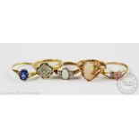 A selection of gem set rings,