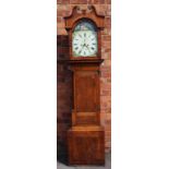 An early 19th century and later oak and mahogany eight day longcase clock,