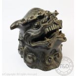 A large 19th century Chinese bronze temple Fu Dog head,