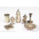 A collection of small silver, to include four condiments, a pierced sweet dish,