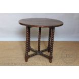 An early 18th century and later oak circular occasional table, on bobbin legs, 65cm H x 74cm diam,