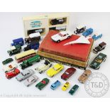 A selection of boxed and unboxed die-cast toys including Corgi,