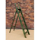 A set of green painted pine vintage ladders or library steps,