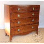 A George III mahogany chest, with two short and thee graduated long drawers,