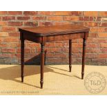 A Regency mahogany tea table, the top with a reeded edge, on turned legs,