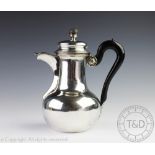 A late 19th century Continental silver hot water pot,