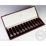 A cased set of twelve Birmingham Mont Apostle spoons, Birmingham 1978 and 1979,