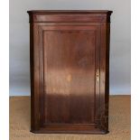 A George III style inlaid mahogany corner cabinet,