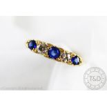A diamond and untested sapphire ring,