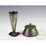 A Tudric pewter vase designed by Archibald Knox for Liberty & Co, No 0821, decorated with flowers,
