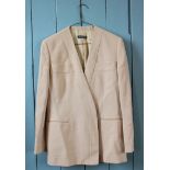A collection of ladies fashion garments to include a two Giorgio Armani jackets in peach and ivory,