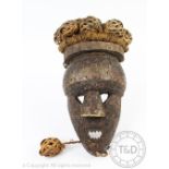 An African tribal art Congo Salampasu mask with rattan hair,