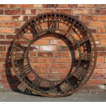 A 19th cast iron large clock dial attributed to Thomas Cooke & Son of York, with Roman numerals,