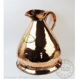 A copper four gallon wine measure, with engraved brass plate 'To hold four imperial gallons',