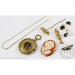 A selection of jewellery to include; a mourning locket with aperture enclosing hair,